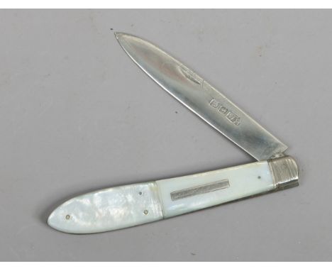 A folding silver fruit knife with mother of pearl scales by William Neale. Assayed Birmingham, no date letter. 