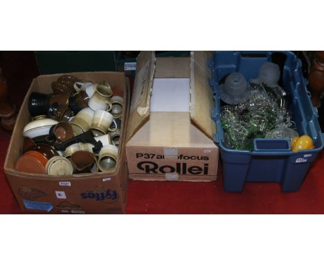 Two boxes of miscellaneous to include kitchenalia and glassware along with a Rollei projector. 