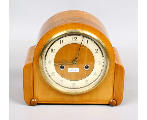 A walnut cased Smith Enfield eight day mantle clock chiming on a coiled gong, complete with pendulum and key