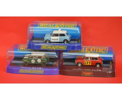 3 SCALEXTRIC MINIS: C3213 Morris Mini Police Car, C2807 Mini Cooper Classic R.Aaltonen, C3302 Bob Holden Mini. All excellent/