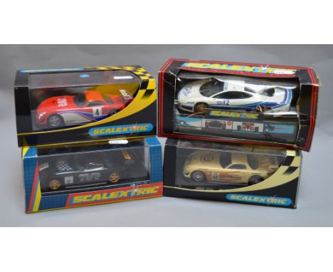 4 SCALEXTRIC CARS: C2189 TVR Speed 12 Esso Ultron, unlabelled TVR Speed 12, C2195 TVR Speed 12 Works and C2013 Jaguar XJ220 I