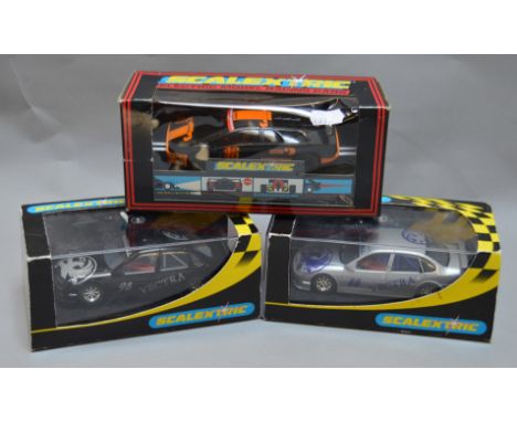 3 SCALEXTRIC CARS: C2003 Lamborghini Diablo Ceric and two Vauxhall Vectras. Very good/excellent boxed examples.