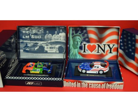 2 FLY SLOT CARS: United In The Cause Of Freedom Dodge Viper GTS R, A 27 Marcos LM600. Both excellent/mint and boxed.