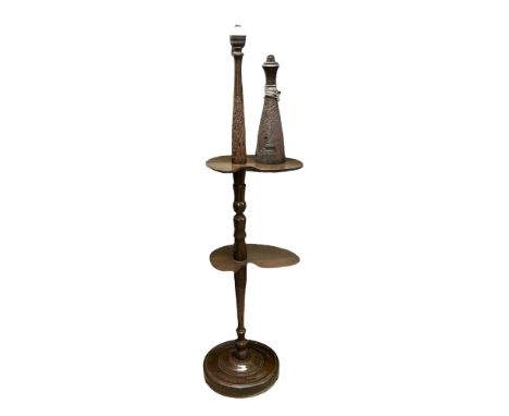 Wooden floor lamp with two shelves with carve oriental scenes, together with a matching table lamp