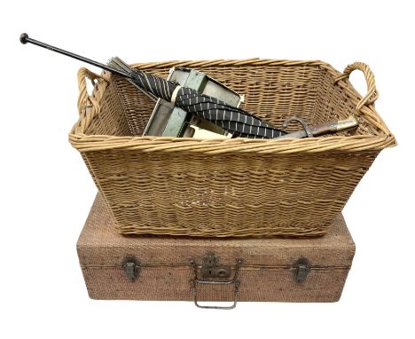 Twin handled wicker basket, together with similar suitcase, umbrella, candlestick etc