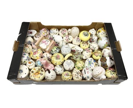 Large collection of ceramic pomanders, to include examples modelled as animals, floral examples etc