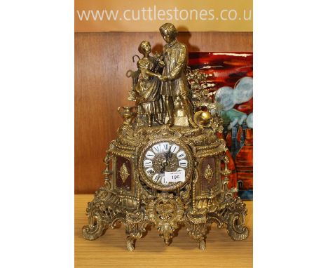A FIGURAL CAST MANTEL CLOCK, WITH TING-TANG QUARTERLY STRIKE