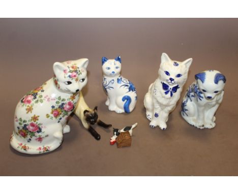A COLLECTION OF CERAMIC CAT FIGURES