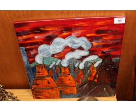 A LARGE ANITA HARRIS SIGNED 'POTTERIES PAST' TILE / PLAQUE, hand painted with red, orange, blue & green glazes, printed and p