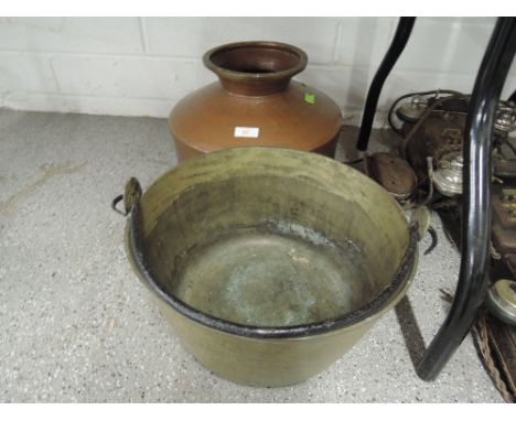 A vintage brass and cast jam pan and hand worked copper and brass container