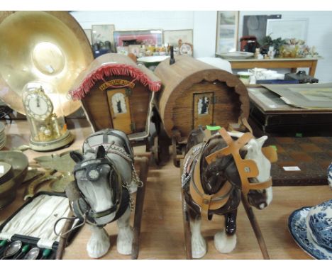 Two ceramic shire horse drawn treen caravans one marked Hargreaves above door