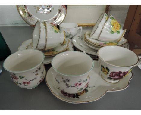 A selection of vintage ceramics tea cups and saucers also tea for one set