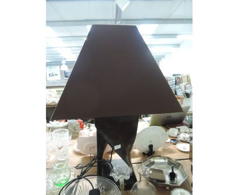 A modernist treen carved table top or bedside style lamp with twist base and matching shade