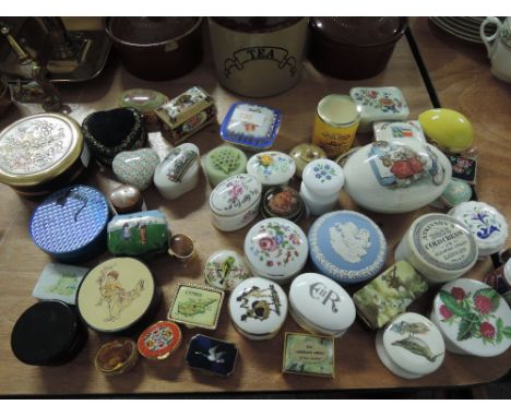 A selection of vintage trinket and jewellery containers tins and boxes