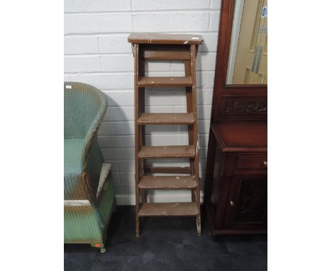 A vintage wooden set of step ladders