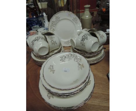 A vintage part tea dinner coffee service un marked cream and gold decal 