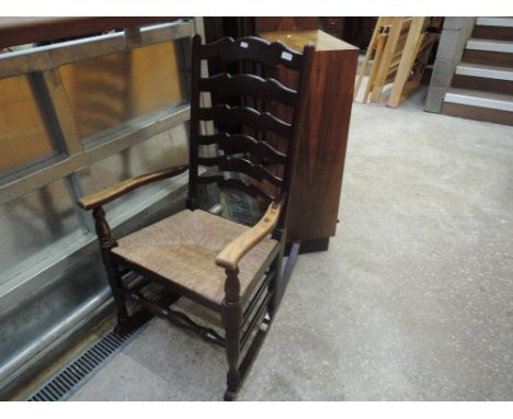 A traditional ladder back rocking chair