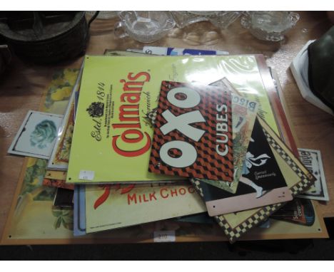 A selection of vintage style advertising boards and signs 