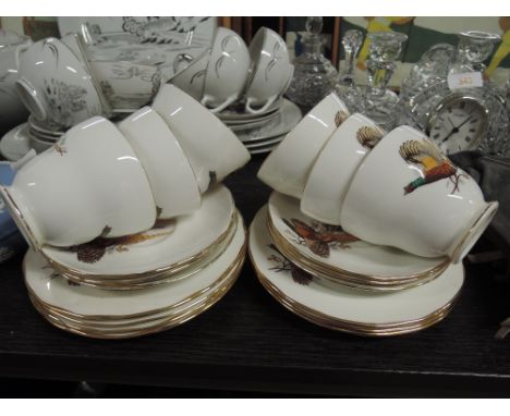 A selection of tea cups and saucers by Duchess