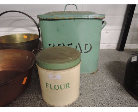 A vintage green enamel bread bin and similar flour container 