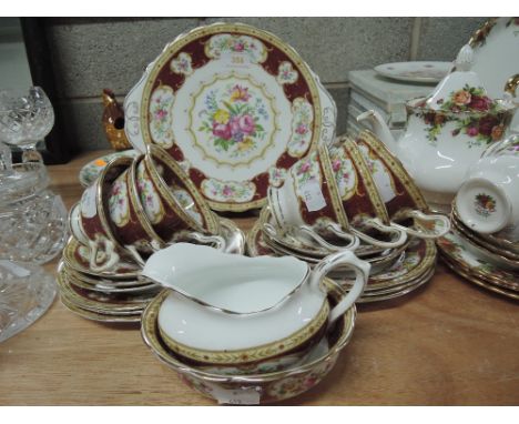 A part tea dinner coffee service by Royal Albert in the Lady Hamilton pattern