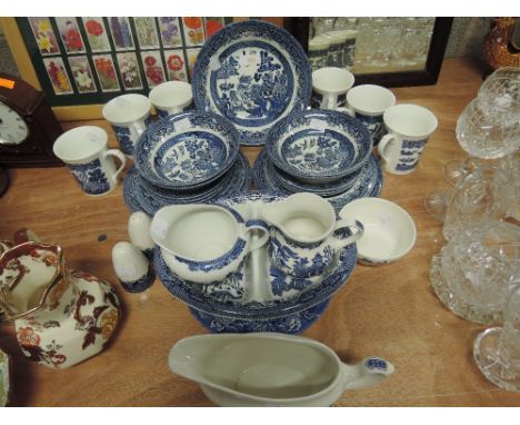 A part tea dinner service by Churchill in a Willow style pattern