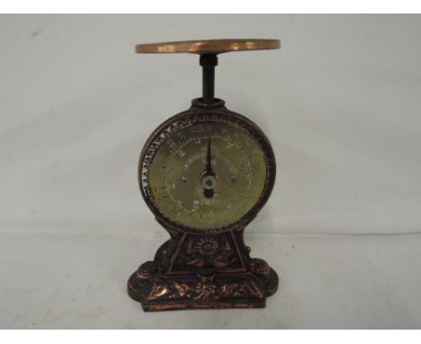 A vintage G P O Salters Letter Balance scale set with copper body and brass face