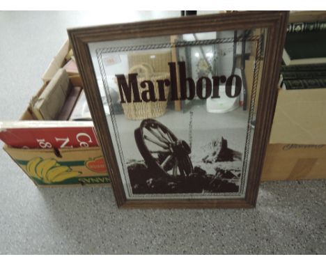 A vintage advertising mirror for Marlboro cigarettes 