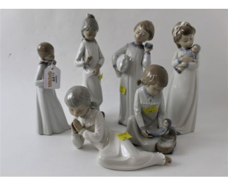 Six Nao figurines