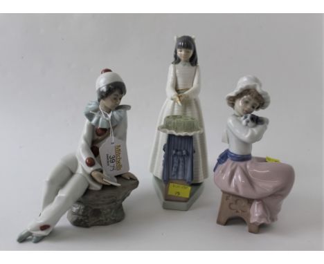 Three Nao figurines