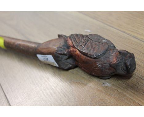 Walking stick decorated with an eagle