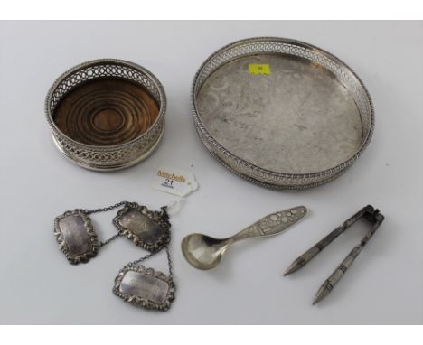 Silver plated galleried tray, wine bottle coaster and three silver decanter labels, Gin, Brandy and Scotch etc