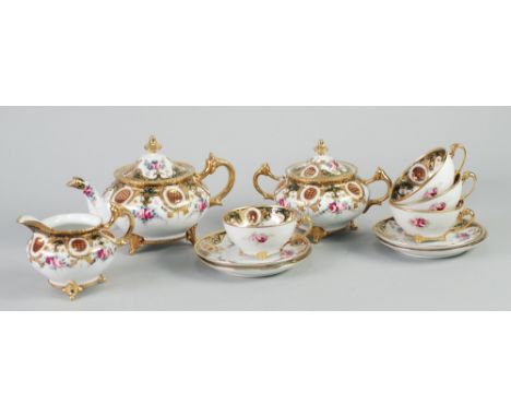 A 1930's JAPANESE NORITAKE PORCELAIN 13 PIECE PART TEA SERVICE, floral enamelled and richly gilded (13) 