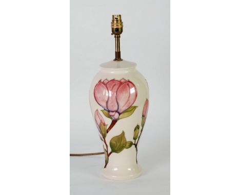 WALTER MOORCROFT MAGNOLIA PATTERN TUBE LINED POTTERY ELECTRIC TABLE LAMP BASE, painted in tones of pink, purple, brown and gr