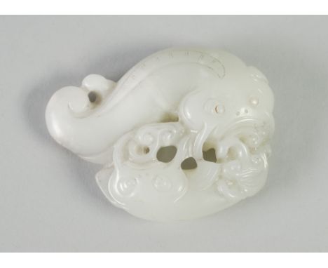 A CHINESE QUING DYNASTY PALE CELADON JADE CARVING OF TWO FISH AMONGST LING-CHIH FUNGUS, 3" (7.5cm) across 