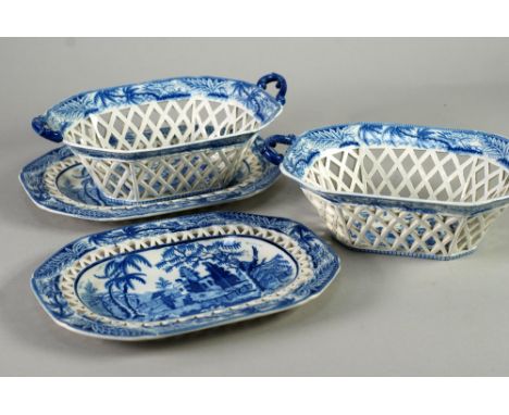 PAIR OF DAVENPORT BLUE AND WHITE TWO HANDLED POTTERY CHESTNUT BASKETS AND STANDS, in the 'Chinese Ruin' pattern of canted obl