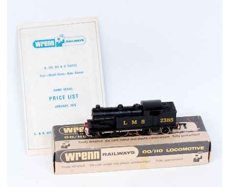 A Wrenn W2215 LMS black 0-6-2 tank engine, chassis requires refixing to body, packer No. 6 on box base (G-BG) sold with a Wre