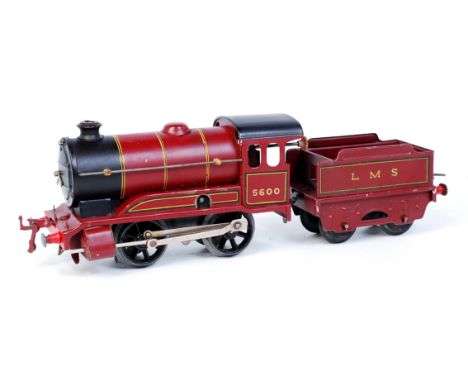 A Hornby clockwork No. 1 engine and tender LMS red No. 5600, with key some minor chips and marks round key hole, but still go