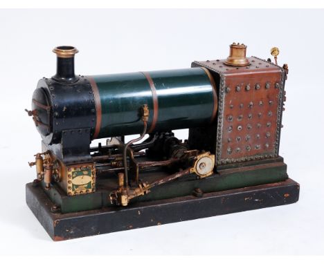 A well engineered model of a non compound twin simple cylinder undertype steam engine, possibly by Bassett Lowke and later ad