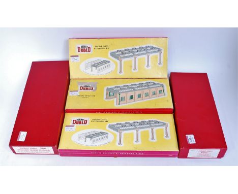 2x Hornby Dublo 5005 2-road engine shed kits and 2x 5006 2-road extension kits, all complete including windows, ventilators, 