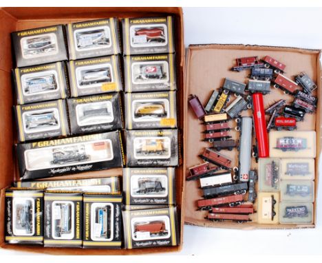 25 boxed and approx 30 unboxed N gauge wagons by Farish, Peco, Lima, etc (G-BG)