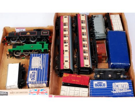 Trays containing Hornby Dublo 2-rail green 0-6-0 tank engine (F) 3-rail EDL7 BR black tank engine, paint loss mainly to raise