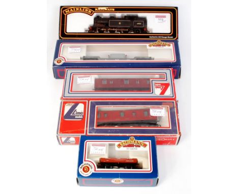 A Mainline 54155 BR lined black class N2  tank engine (G-BG), Bachmann 33-450 and 33-878 wagons (G-BG), and 2 Lima 305357W BR
