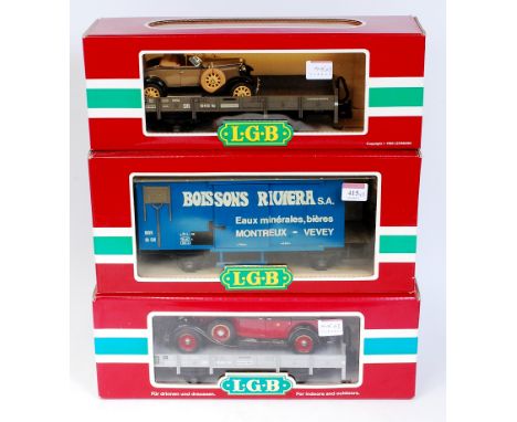 2 LGB ref 4110 wagons, both with vintage car loads added (G-BG) and a ref 4029 'Boissons' van (G-BG)