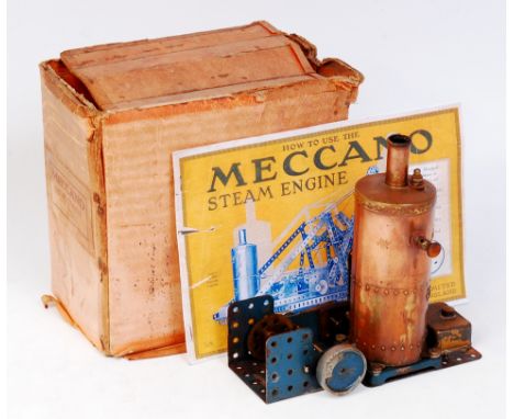 A very rare Meccano 1920s Steam Engine, comprising of spirit fired vertical boiler, with filler safety valve, lever for steam