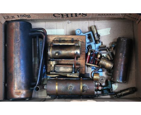 A collection of various steam engine spare parts and accesories to include, part complete boiler, ramsbottom valves, hand pum