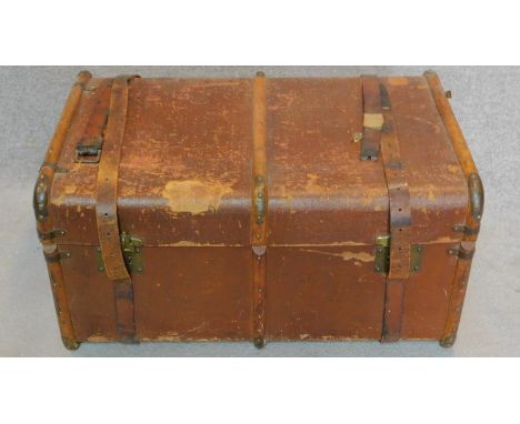 A vintage travelling trunk. H.44 W.84 D.54cm 