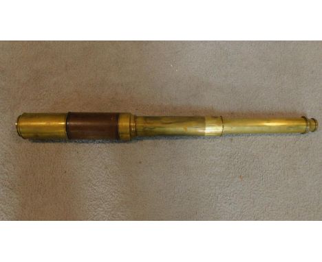 A 19th century three draw brass telescope incribed Dolland London, Night and Day. L.80cm 