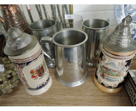 A selection of vintage steel and ceramic musical tankards