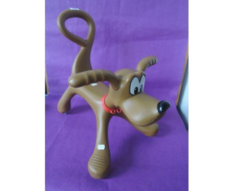 A childrens walker by Chad Valley in the form of a friendly dog